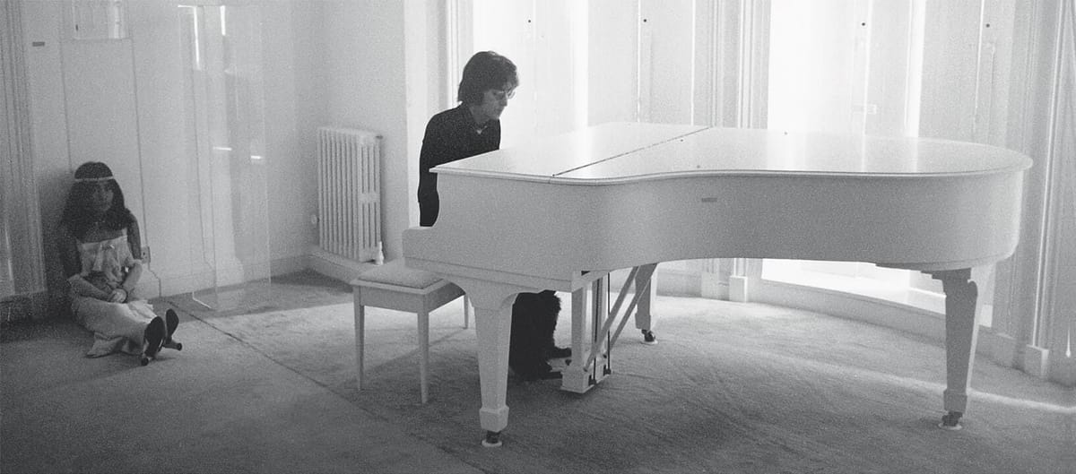 John-Lennon-playing-the-piano-with-Yoko-Ono-Tittenhurst-Park-in-Ascot-smaller-min.jpg